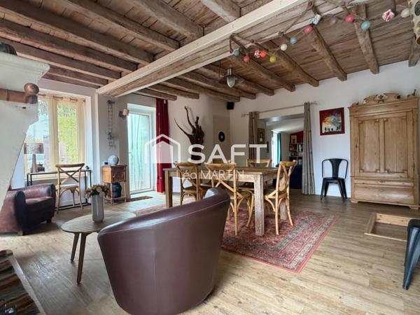? Une demeure de caractère... avec la possibilité de détacher une parcelle constructible : une opportunité rare !