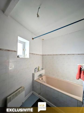 GARANTIE 12 MOIS INCLUS ! Maison de ville avec garage et grand jardin !