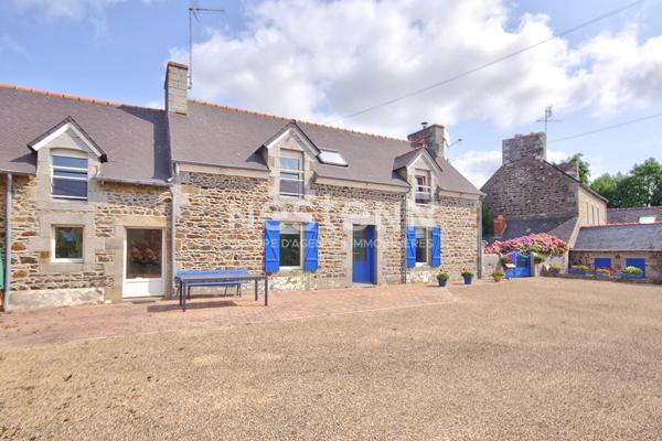 Belle longère en pierre de 192m² avec dépendance de 53m² et son grand jardin situé à Tréméloir