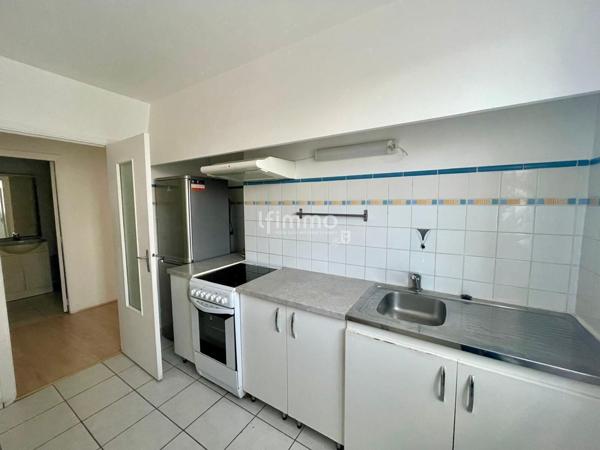 T2 avec balcon Place Dupuy + cave + parking sous-sol