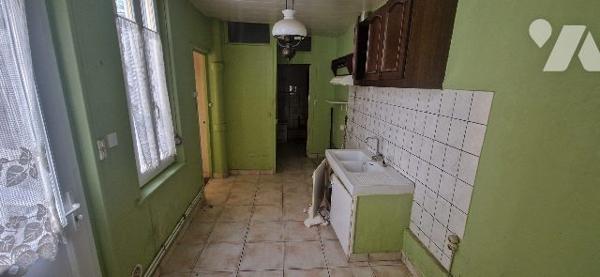 Appartement à rénover au RDC d'une petite copro du centre ville
