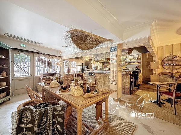 Immeuble composé de locaux commerciaux et d’un appartement – idéal investissement.