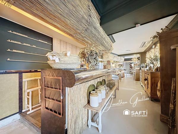 Immeuble composé de locaux commerciaux et d’un appartement – idéal investissement.