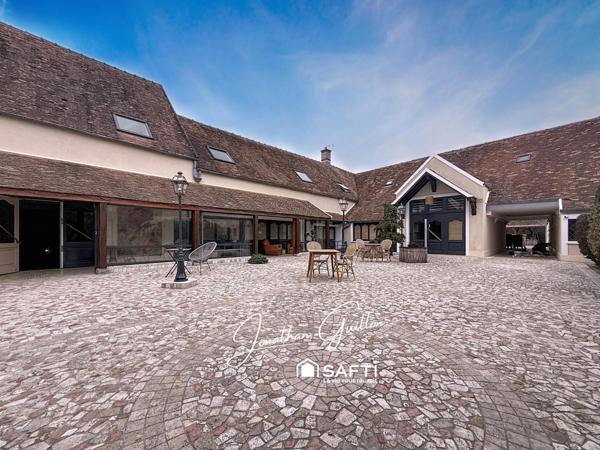 Immeuble composé de locaux commerciaux et d’un appartement – idéal investissement.