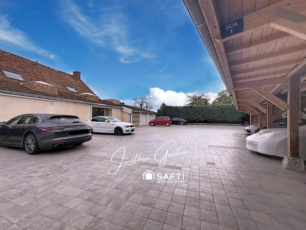 Immeuble composé de locaux commerciaux et d’un appartement – idéal investissement.