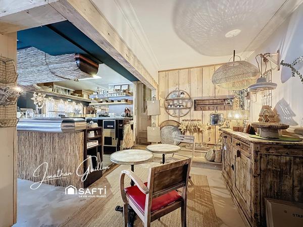 Immeuble composé de locaux commerciaux et d’un appartement – idéal investissement.