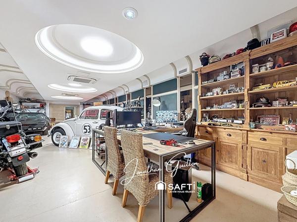 Immeuble composé de locaux commerciaux et d’un appartement – idéal investissement.