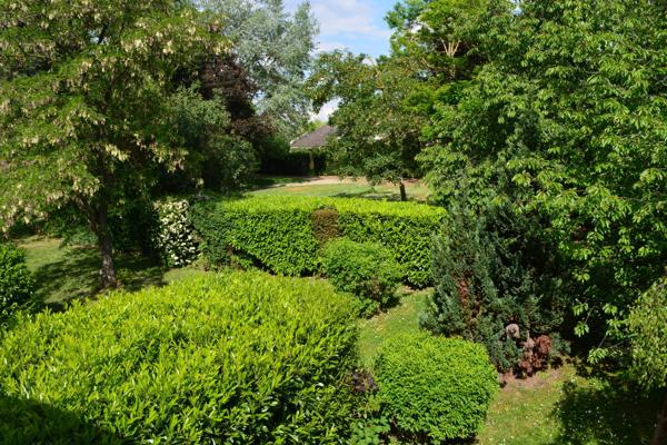 Maison familiale  4 chambres avec double jardin privatif dans un cadre privilégié