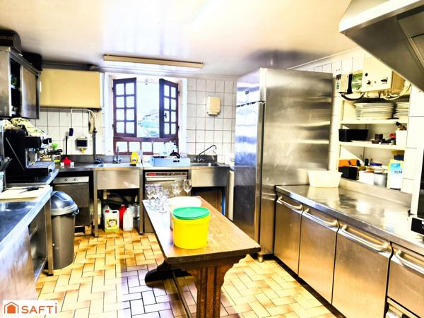 Murs commerciaux comprenant restaurant gastronomique réputé, appartement de fonction et terrain constructible