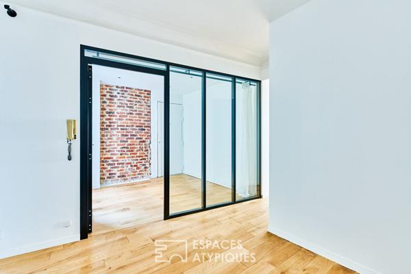 Ancien studio photo transformé en triplex à Marcadet – Poissonniers