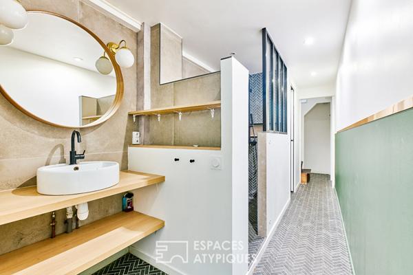 Ancien studio photo transformé en triplex à Marcadet – Poissonniers