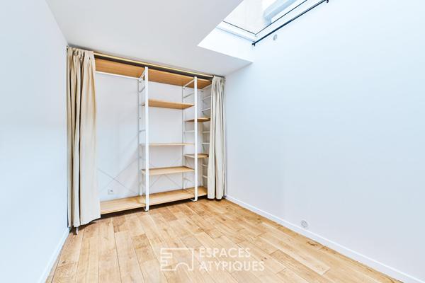 Ancien studio photo transformé en triplex à Marcadet – Poissonniers