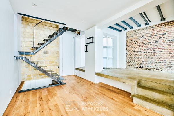 Ancien studio photo transformé en triplex à Marcadet – Poissonniers