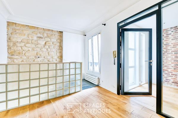 Ancien studio photo transformé en triplex à Marcadet – Poissonniers