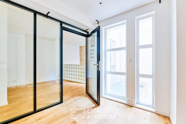 Ancien studio photo transformé en triplex à Marcadet – Poissonniers