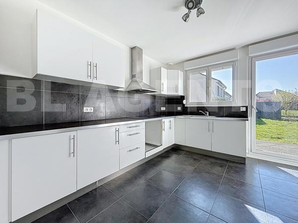 Maison 4 chambres avec jardin et garage 