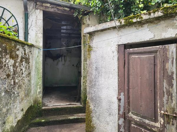 Maison de ville à restaurer au fort potentiel