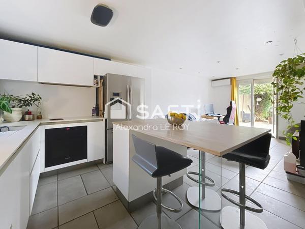 Appartement type F2 avec : Espace de stationnement, Terrasse, Jardin et Atelier !!!!