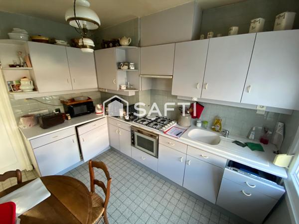 Maison de ville avec 3 ch - jardin - garage - sous-sol