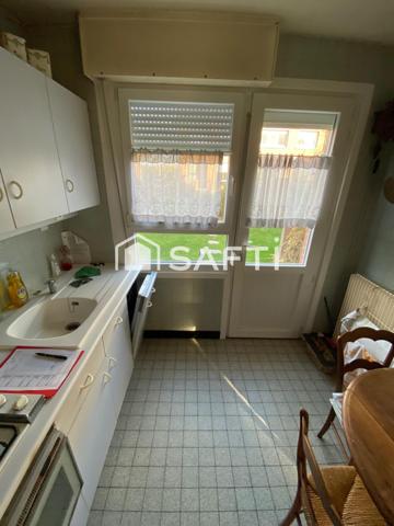 Maison de ville avec 3 ch - jardin - garage - sous-sol