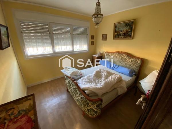 Maison de ville avec 3 ch - jardin - garage - sous-sol