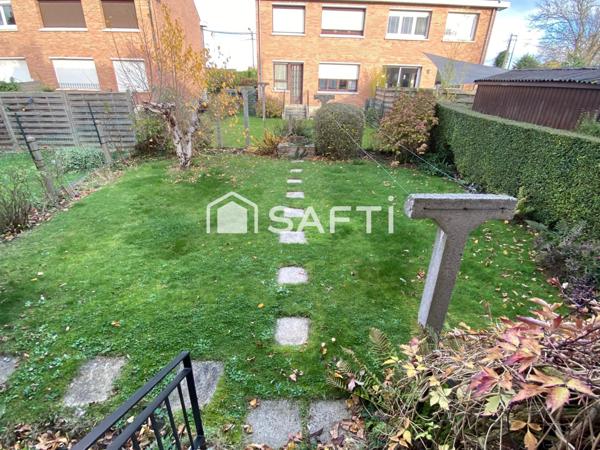 Maison de ville avec 3 ch - jardin - garage - sous-sol