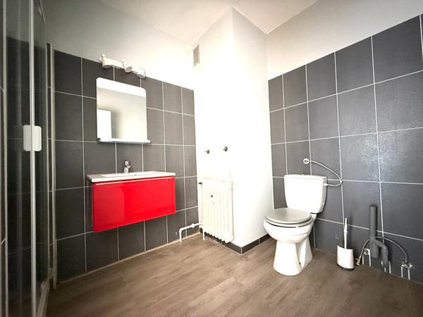 Appartement type 2- balcon et place de parking