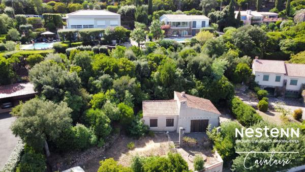 Terrain à fort potentiel avec maison des années 60 à rénover
