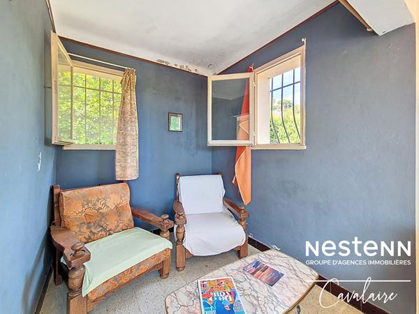 Terrain à fort potentiel avec maison des années 60 à rénover