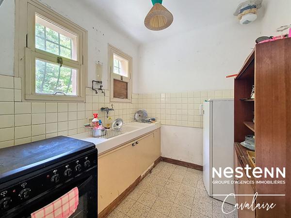 Terrain à fort potentiel avec maison des années 60 à rénover