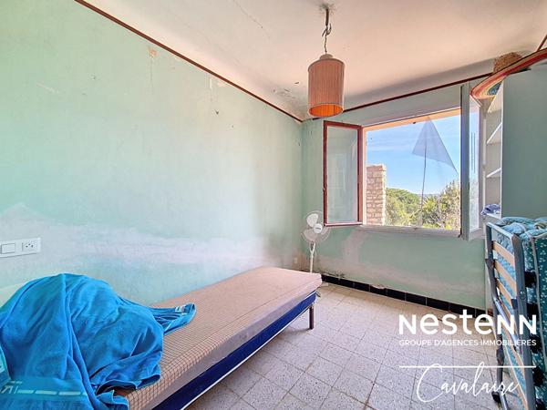 Terrain à fort potentiel avec maison des années 60 à rénover