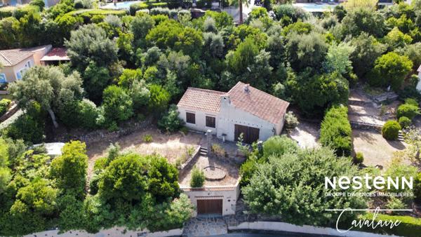 Terrain à fort potentiel avec maison des années 60 à rénover