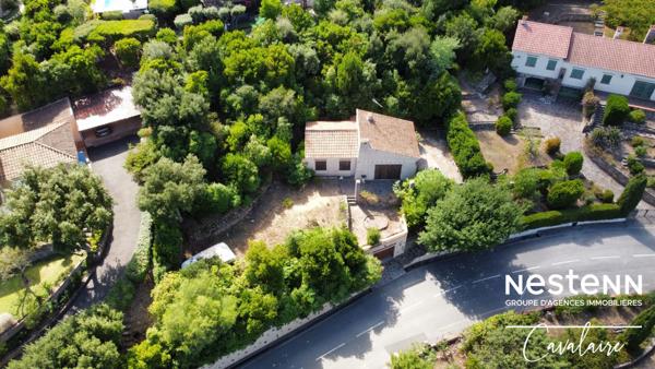 Terrain à fort potentiel avec maison des années 60 à rénover