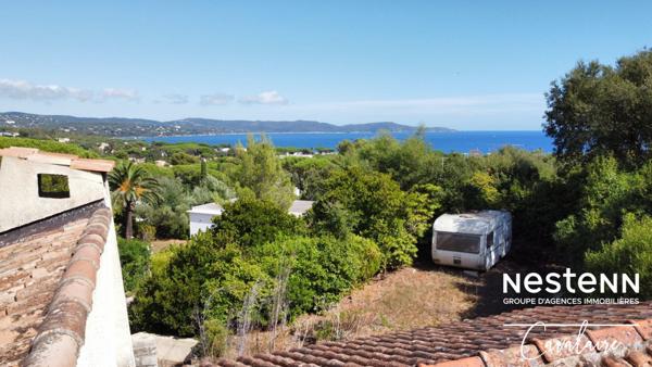 Terrain à fort potentiel avec maison des années 60 à rénover