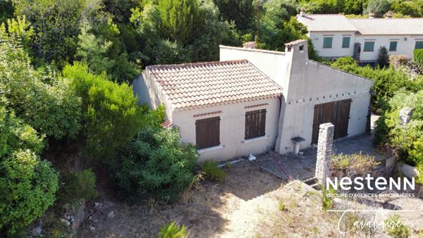 Terrain à fort potentiel avec maison des années 60 à rénover