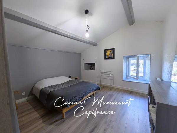 Maison en pierre rénovée – Grand espace de vie, charme et performance énergétique