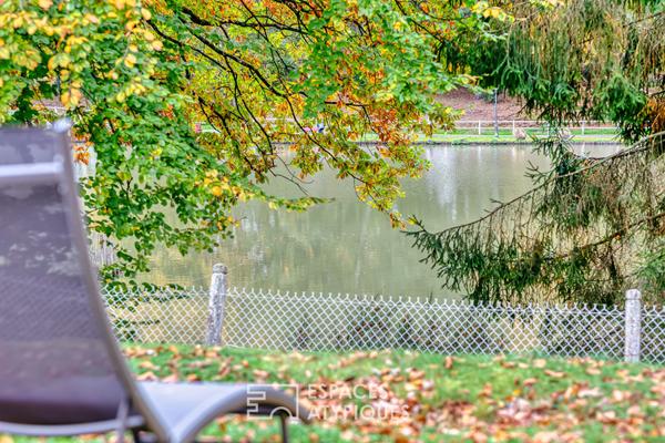 Maison de plain-pied vue sur lac