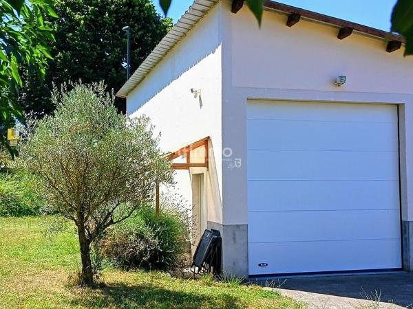 Terrain d'agrément + garage à camping-car