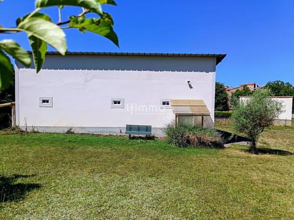 Terrain d'agrément + garage à camping-car