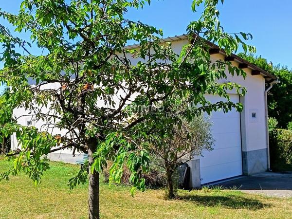 Terrain d'agrément + garage à camping-car