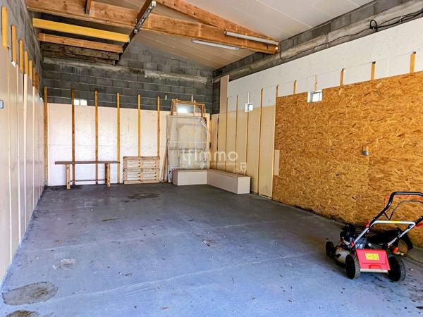 Terrain d'agrément + garage à camping-car