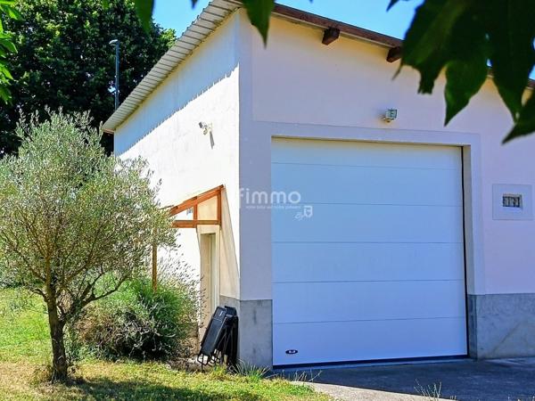 Terrain d'agrément + garage à camping-car