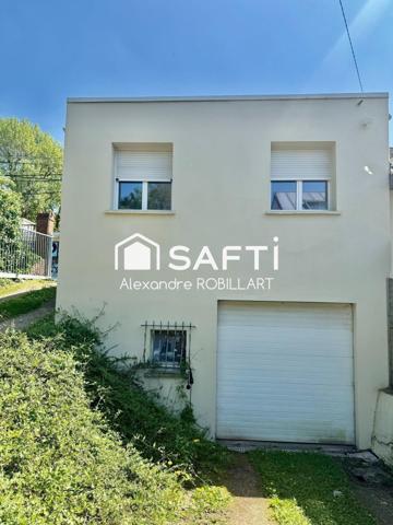 LOCAL PROFESSIONNEL AVEC TERRAIN ET GARAGE