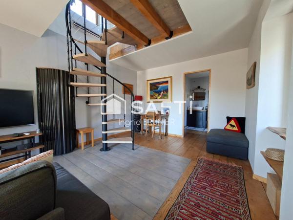 Maison en pierre avec une grange aménageable