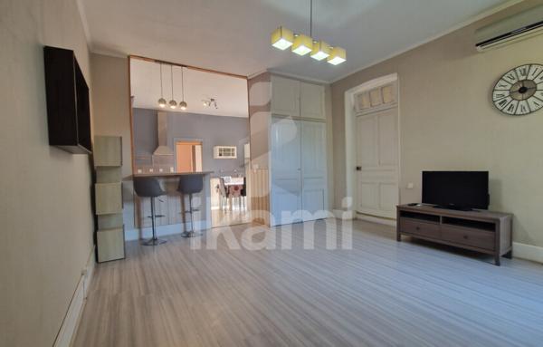 Romans centre : T2 de 69 m2 en rez-de-chaussée, terrasse, parking, cave