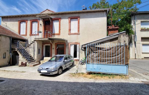 Romans centre : T2 de 69 m2 en rez-de-chaussée, terrasse, parking, cave