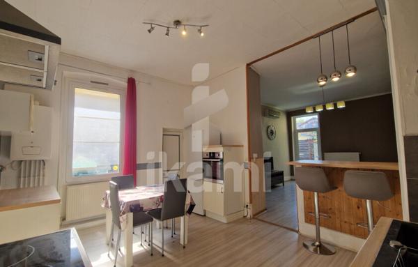 Romans centre : T2 de 69 m2 en rez-de-chaussée, terrasse, parking, cave