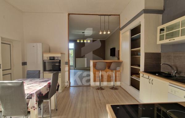 Romans centre : T2 de 69 m2 en rez-de-chaussée, terrasse, parking, cave