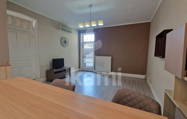 Romans centre : T2 de 69 m2 en rez-de-chaussée, terrasse, parking, cave