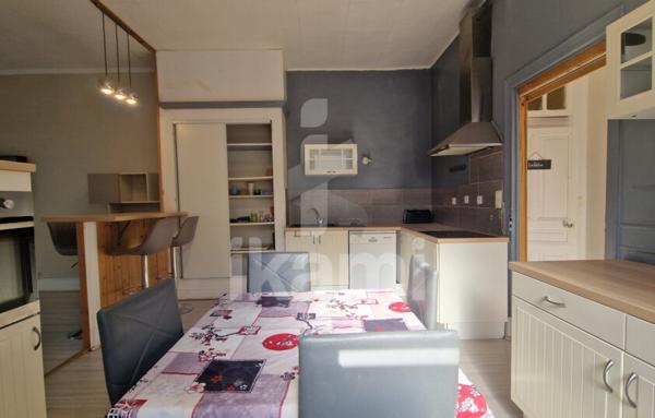 Romans centre : T2 de 69 m2 en rez-de-chaussée, terrasse, parking, cave